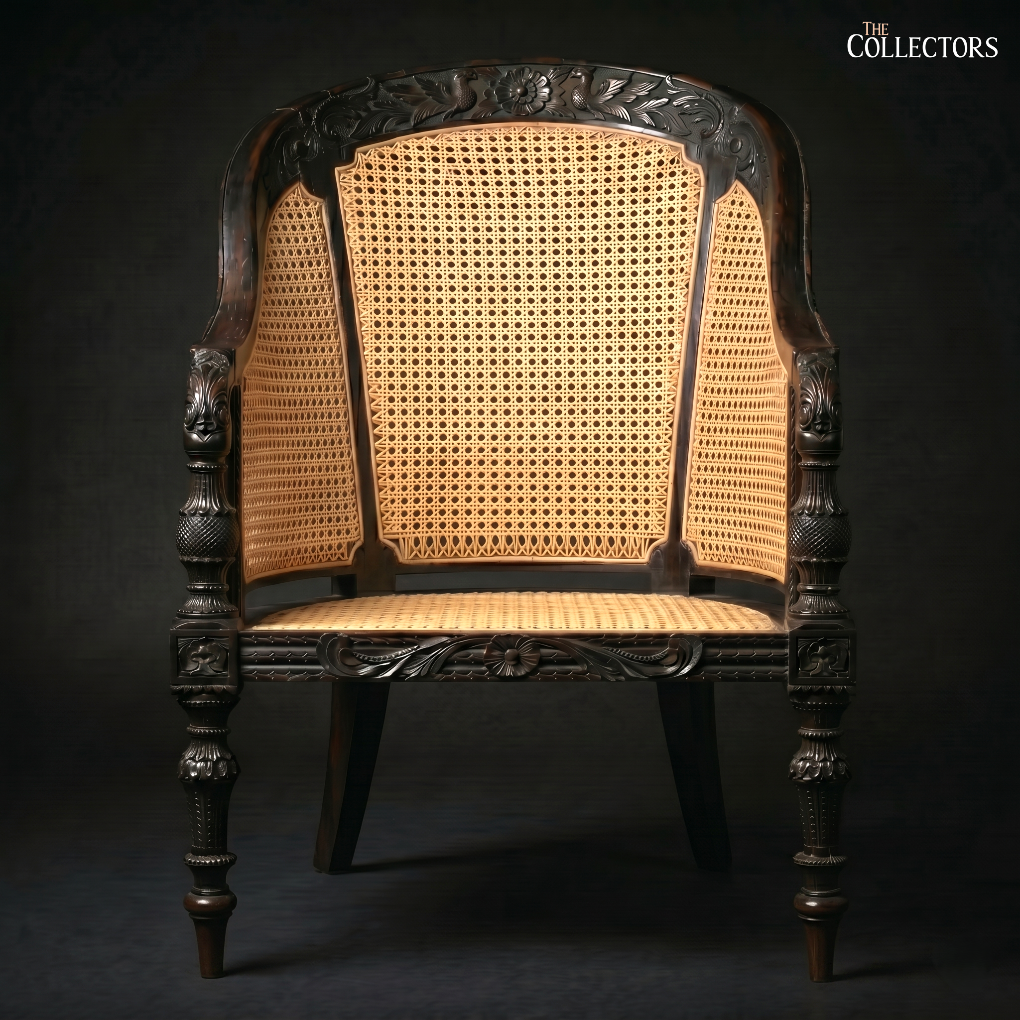 The Ceylonese Colonial Carved Cane Bergère