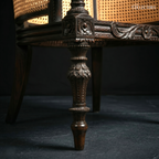The Ceylonese Colonial Carved Cane Bergère