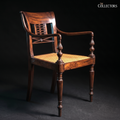The Colombo Pierced-Back Elbow Chair