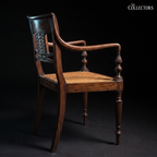 The Colombo Pierced-Back Elbow Chair