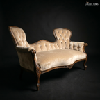 The Victorian Rococo Revival Double-Back Settee