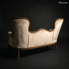 The Victorian Rococo Revival Double-Back Settee