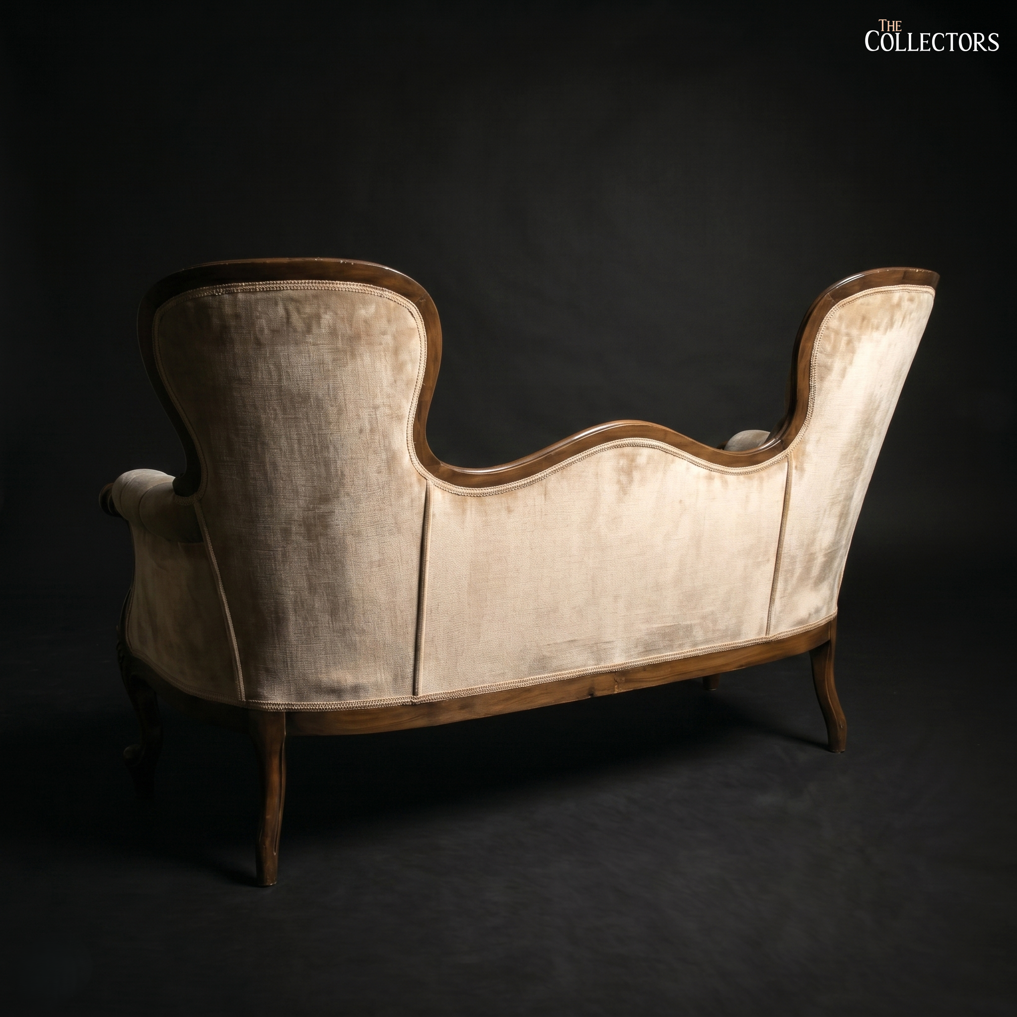 The Victorian Rococo Revival Double-Back Settee